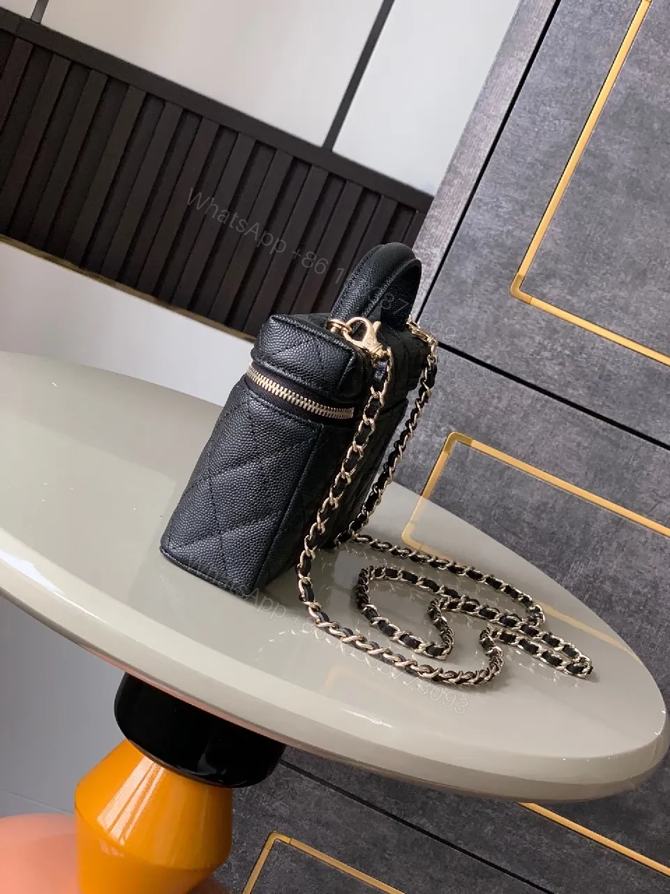 View 2 of Compact Quilted Bag with Gold Hardware - Classic Everyday Style
