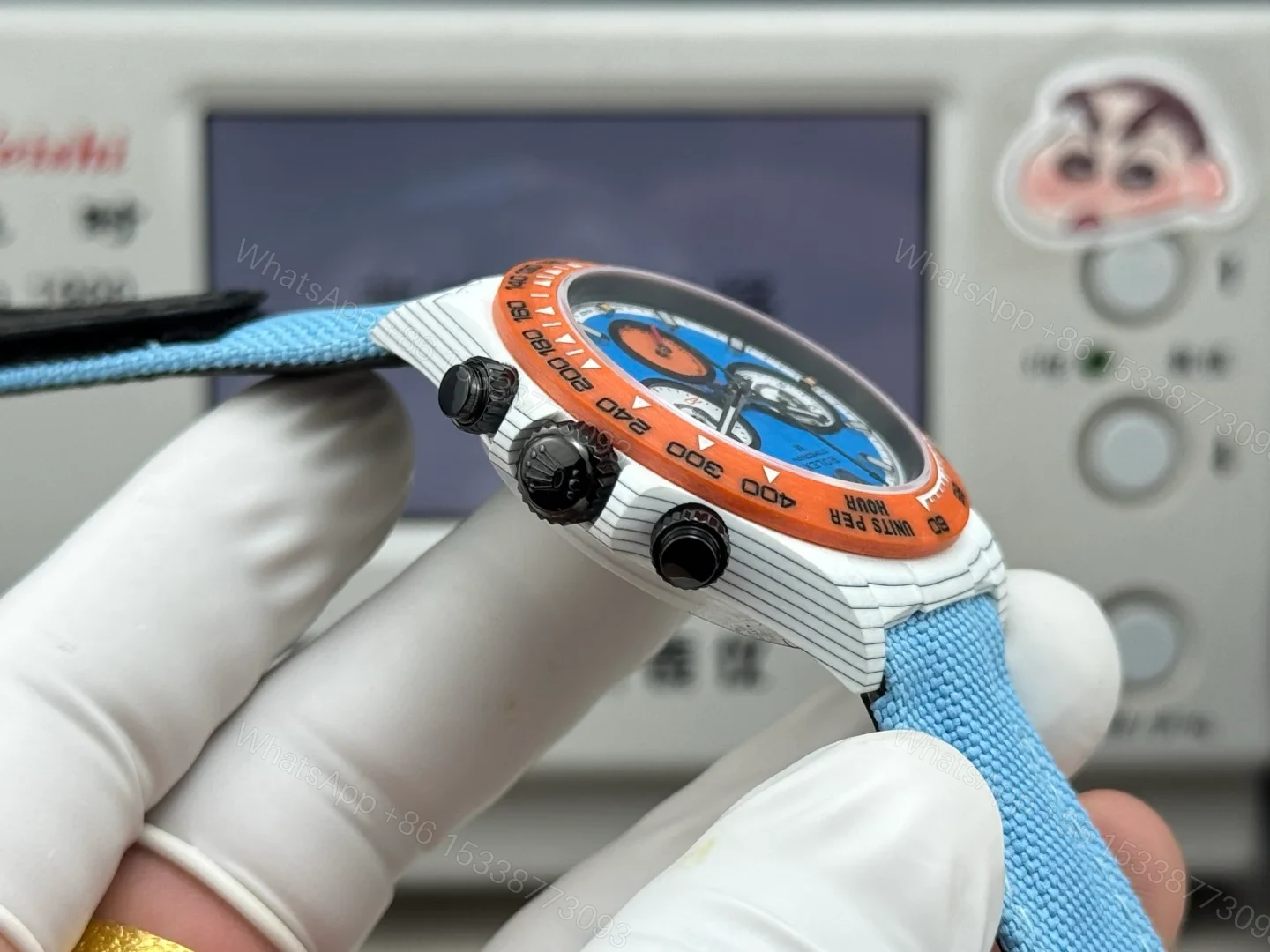 View 7 of Rolex Daytona Carbon Fiber Replica 40MM Exclusive Blue Dial Orange Bezel Fabric Strap R74 RG-ROLEX-DAYTONA