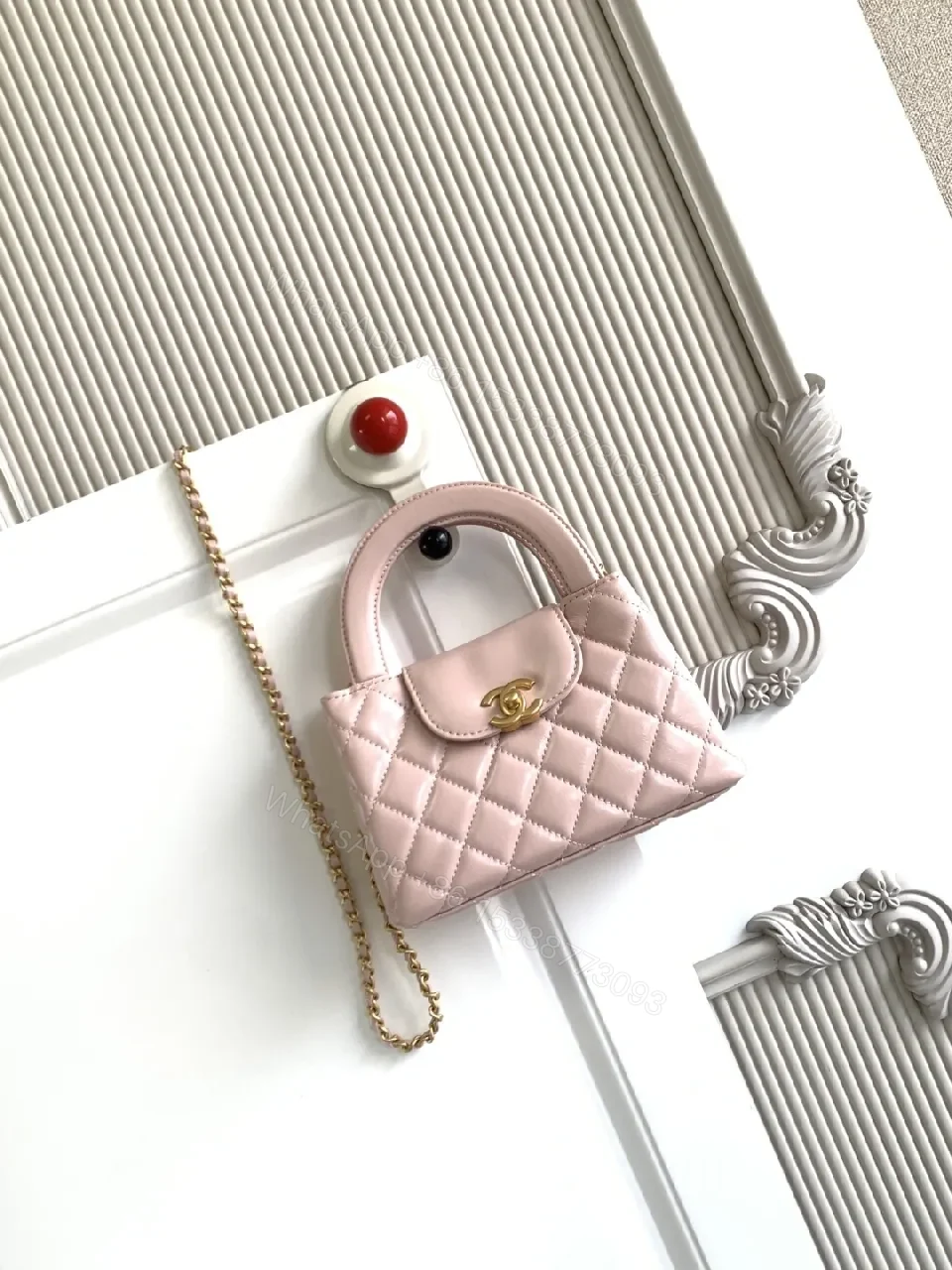 Soft Pink Leather Quilted Mini Bag with Gold Hardware — view 1