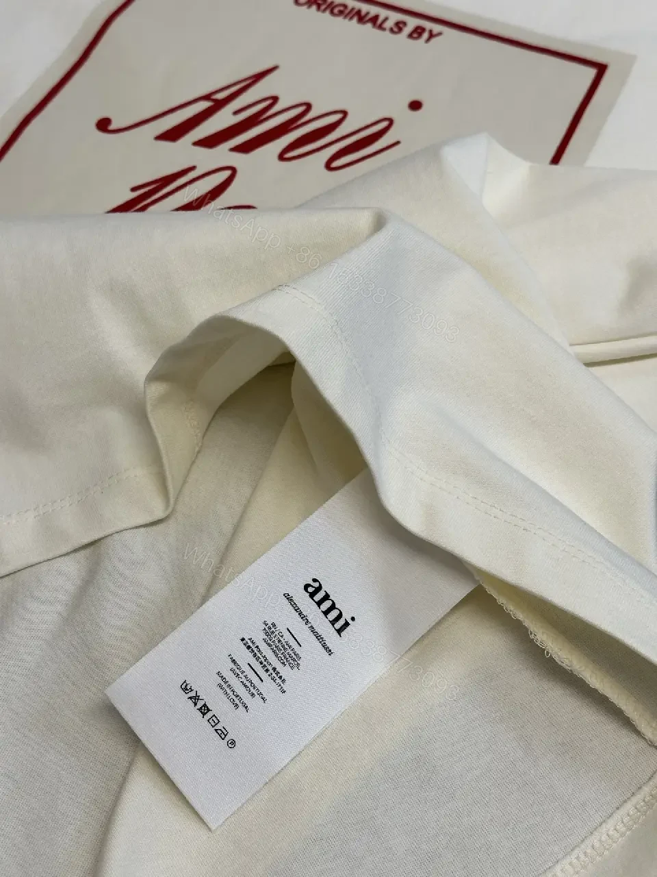 View 2 of Paris Flair Tee: Off-White Cotton Blend, Minimal Crest Graphic