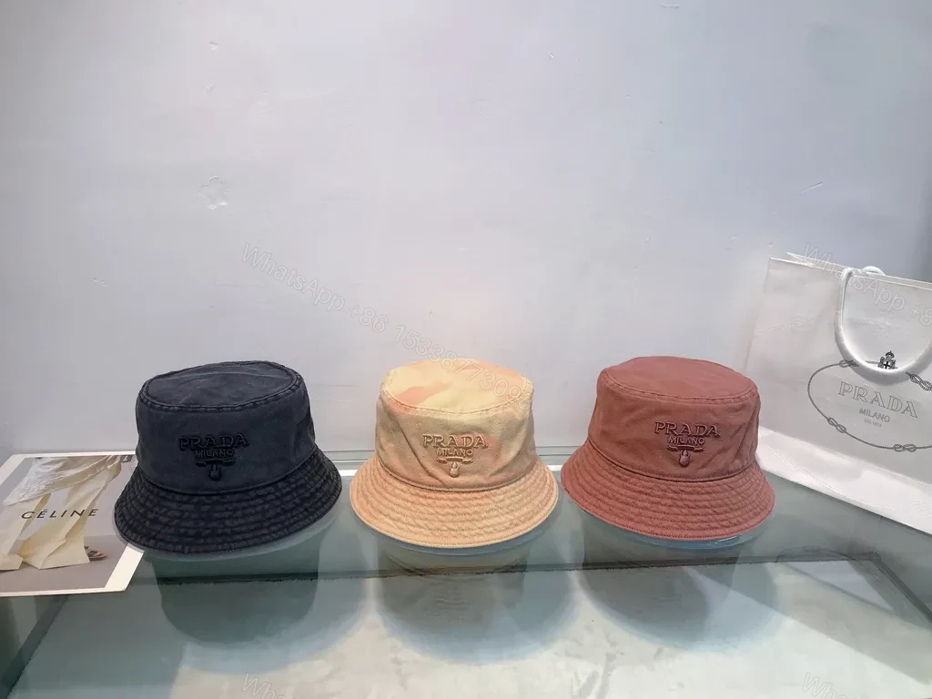 View 2 of Chic Buckle-Textured Pink Palette Bucket Hat - Prada Logo