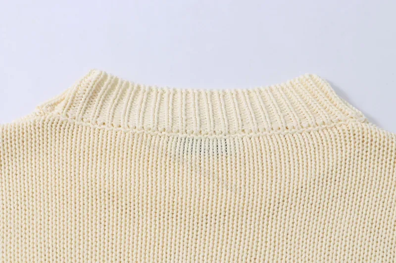 View 2 of Ivory Knit Crewneck with Bold Logo - Elevated Everyday Luxury