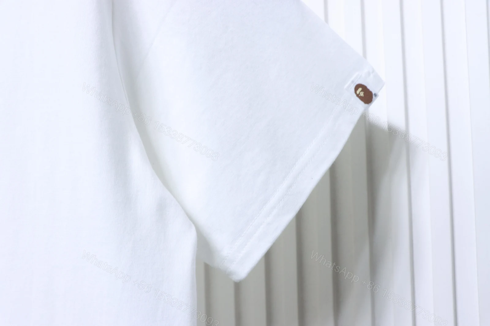 View 4 of BAPE check-pattern ape head letter print short-sleeved T-shirt in white
