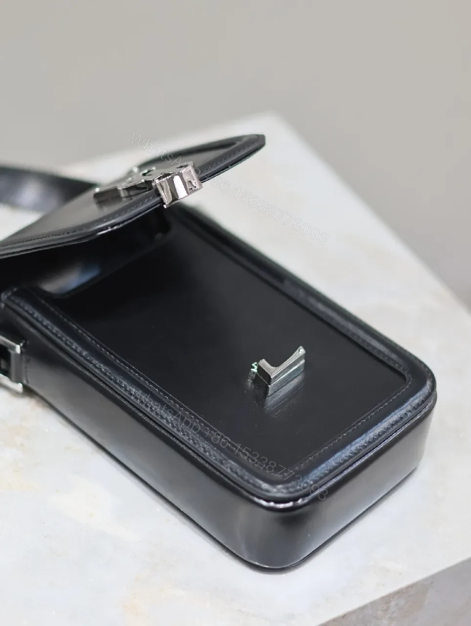 View 2 of Mini Crossbody: Black Leather, Luxe Chic, Logo Clasp, Crossbody Bag