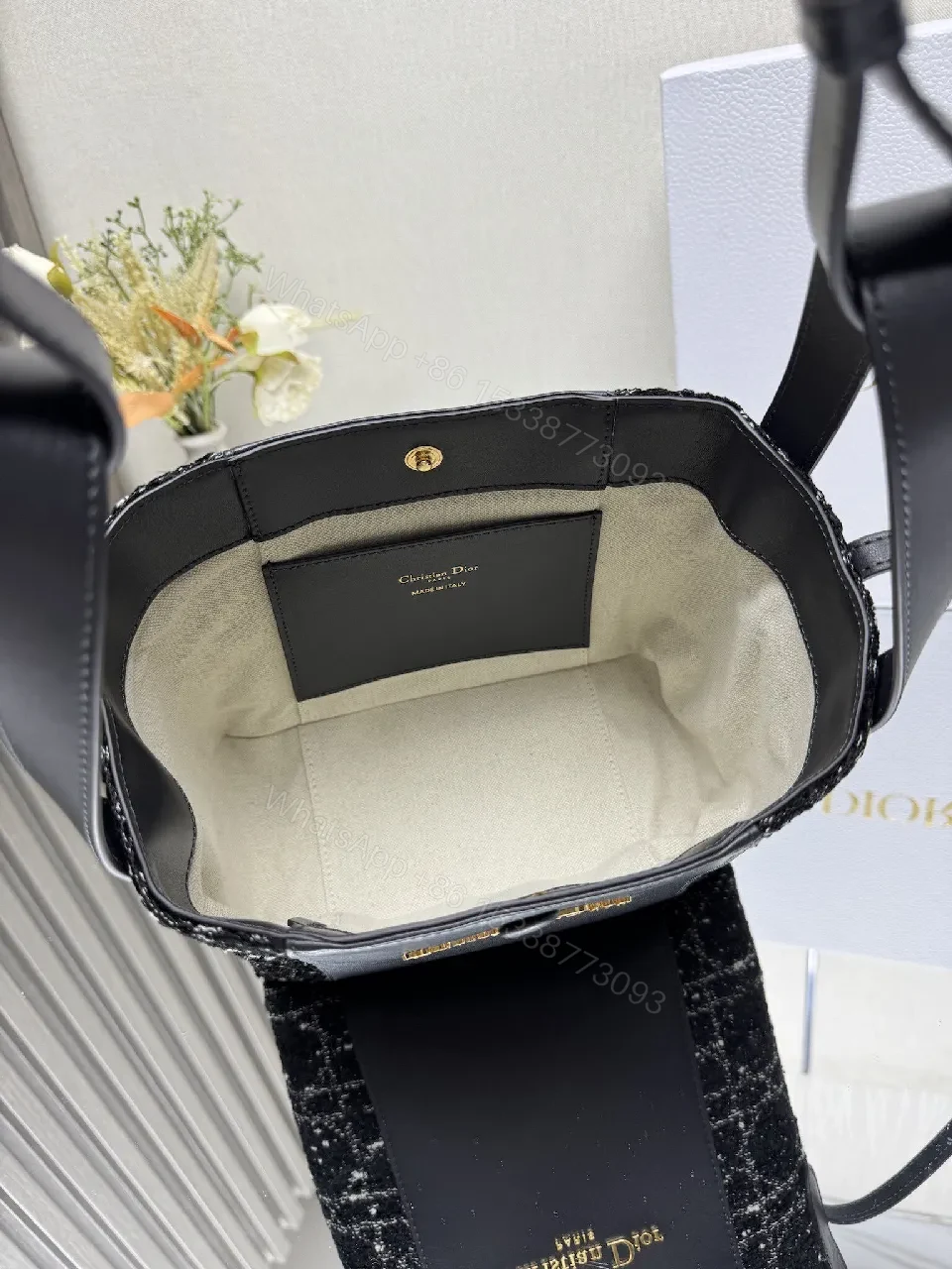 View 9 of Compact Black Leather Tote with Textured Panel, Adjustable Strap