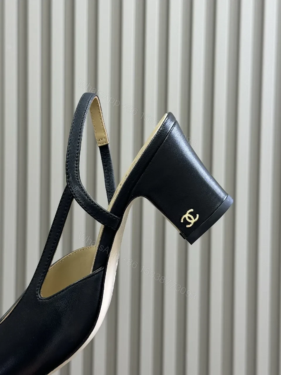 View 3 of Gold-Toe Slingback Pump: Black Leather, Open-Back, All-Day Comfort
