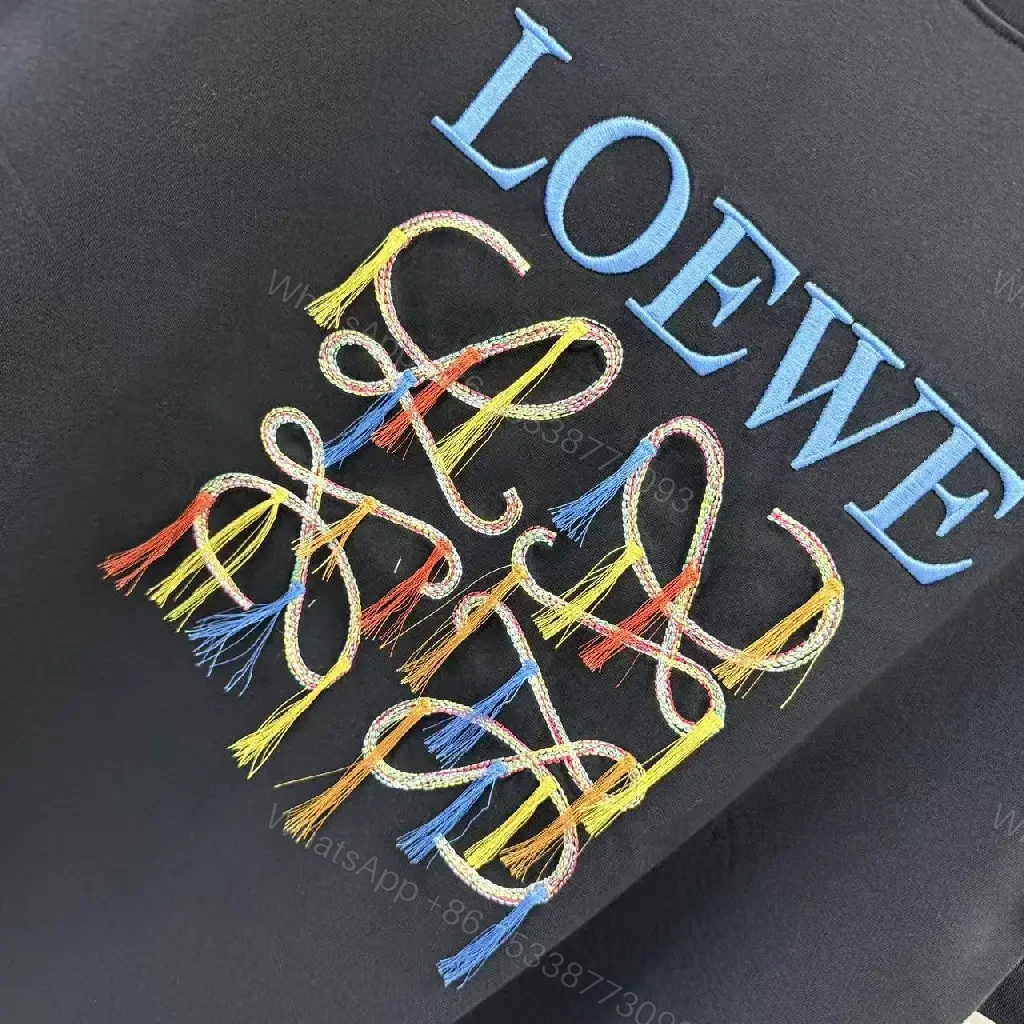 View 2 of Bold Embellished Tee: Black Cotton, Relaxed Fit, Multicolor Embroidery