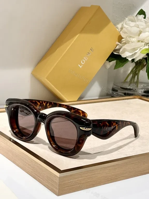 View 4 of Statement Pink Designer Sunglasses: Loewe, UV400, Stylish Comfort