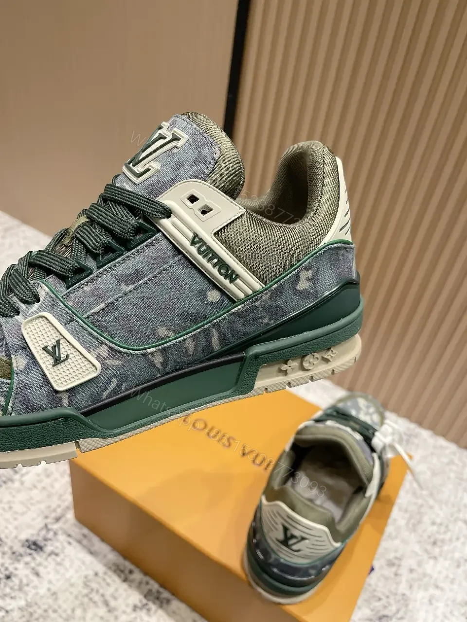 View 7 of Denim Textured Sneaker with LV Detailing, Modern Couture Outdoors