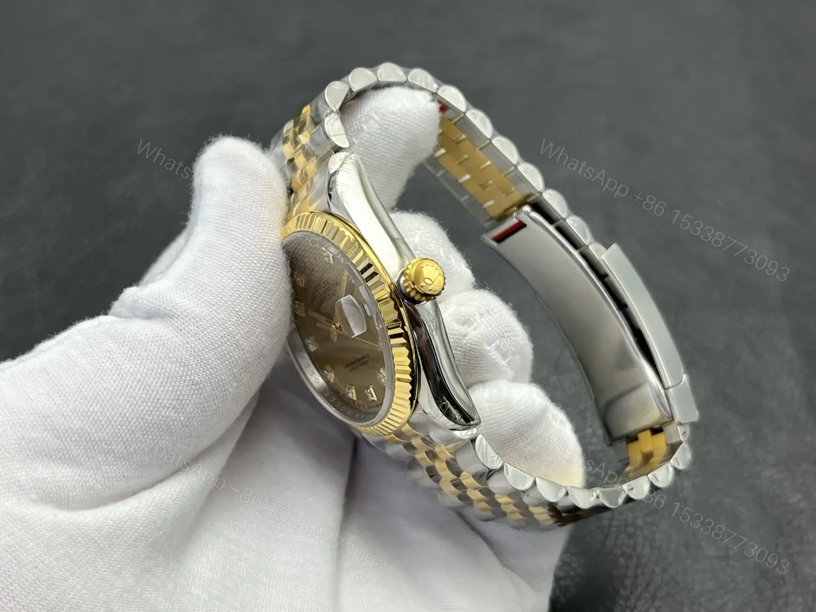 View 6 of Rolex Datejust 36 Stainless Steel Yellow Gold Fluted Champagne Palm Diamond Jubilee 126233-0043