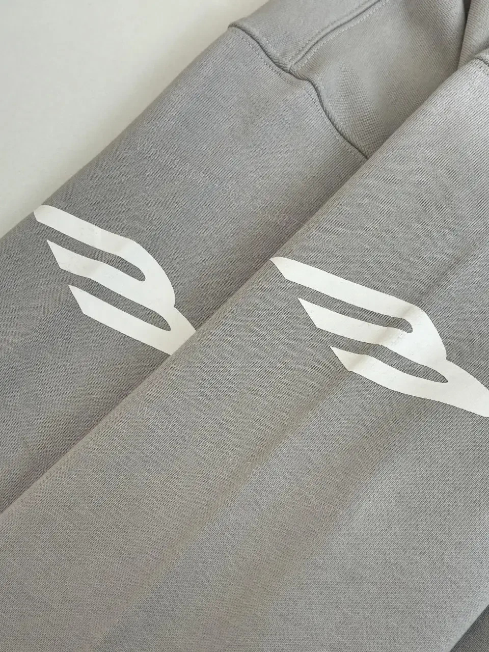 View 13 of Soft-Edge Comfort Hoodie: Graphic Branding, Oversized Streetwear