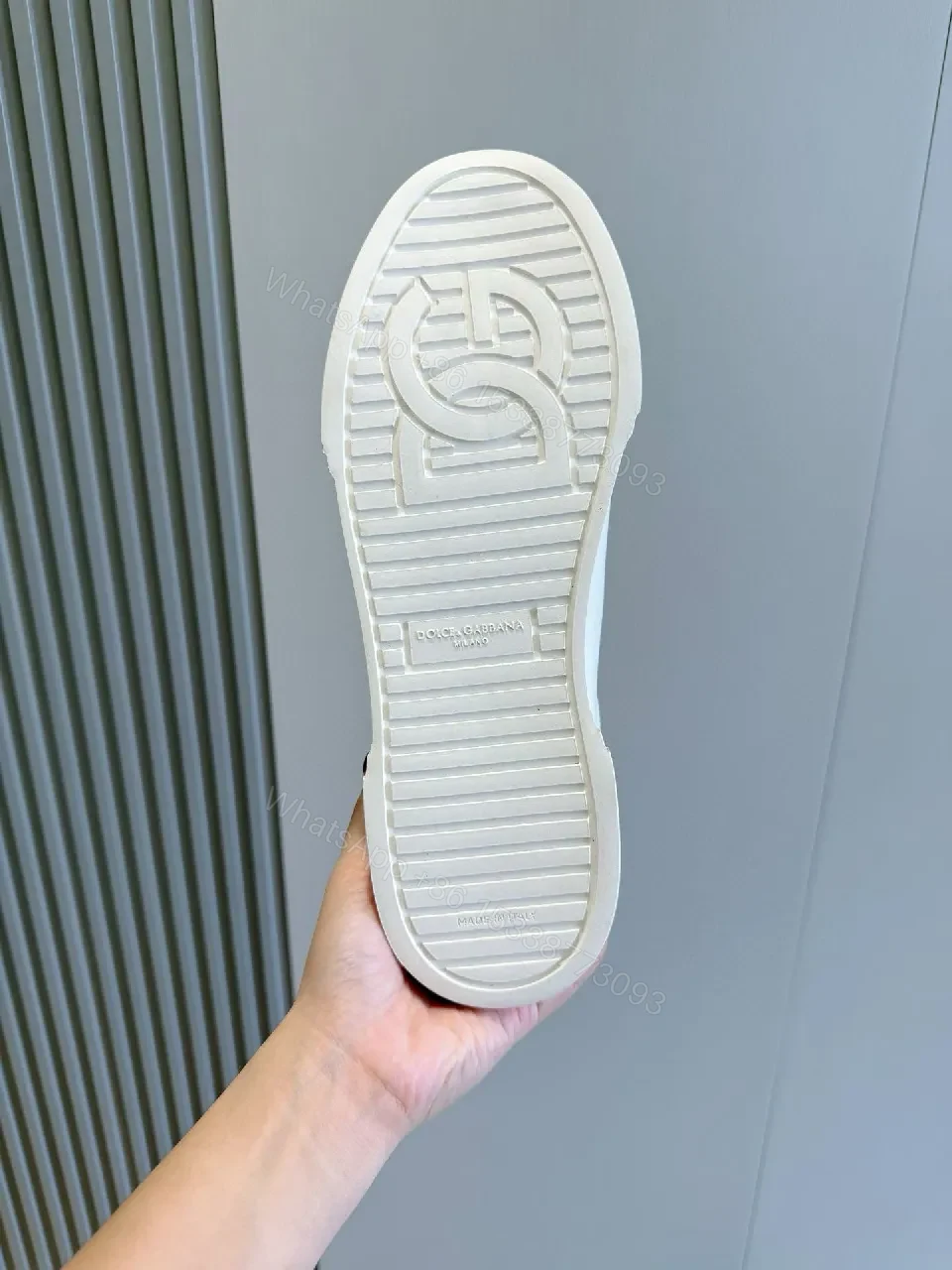 View 2 of Minimal White Leather Sneakers with Subtle Designer Detailing