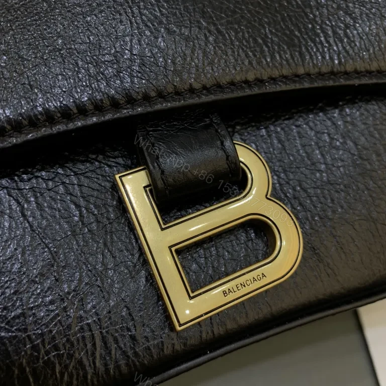 View 2 of Chic Black Leather Crossbody with Bold Gold Hardware Bag