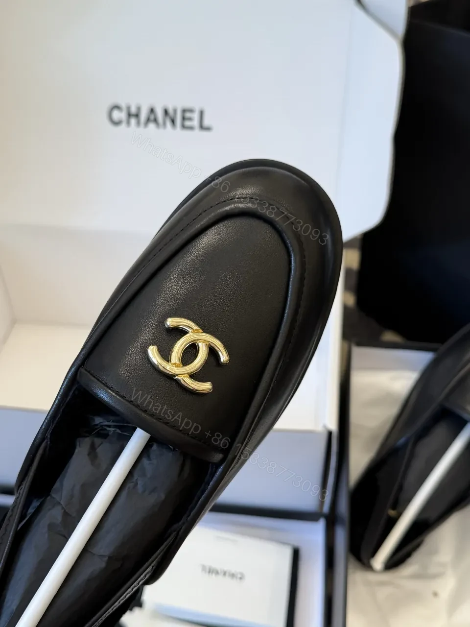 View 7 of Sleek Leather Loafers: Timeless Chic with Gold Logo Hardware