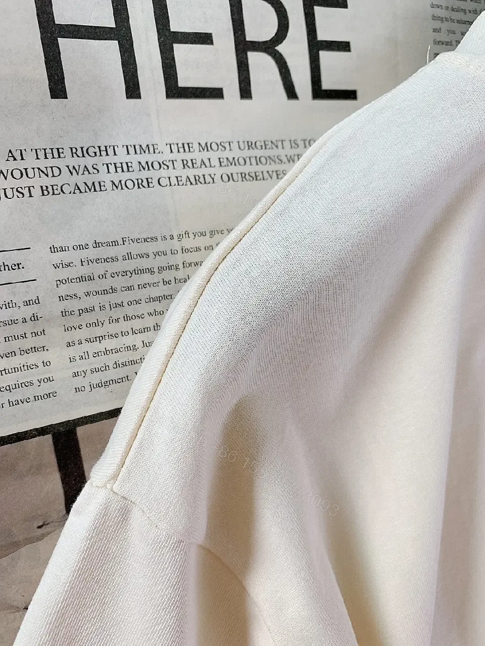 View 7 of Minimalist Off-White Cotton Tee with Signature L.V.M. Accent