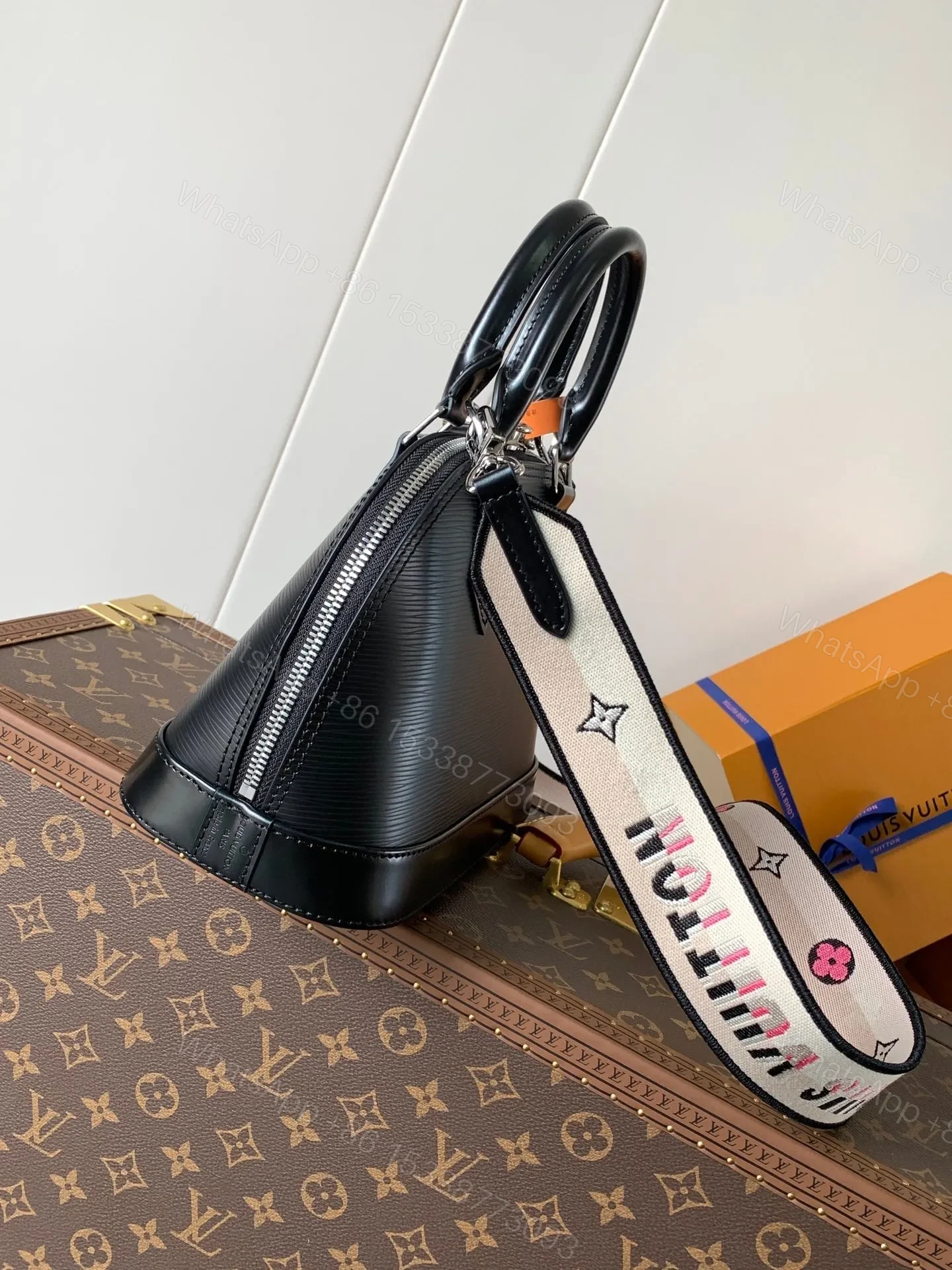View 4 of LV ALMA BB BAG 23 IN BLACK GRAIN COWHIDE