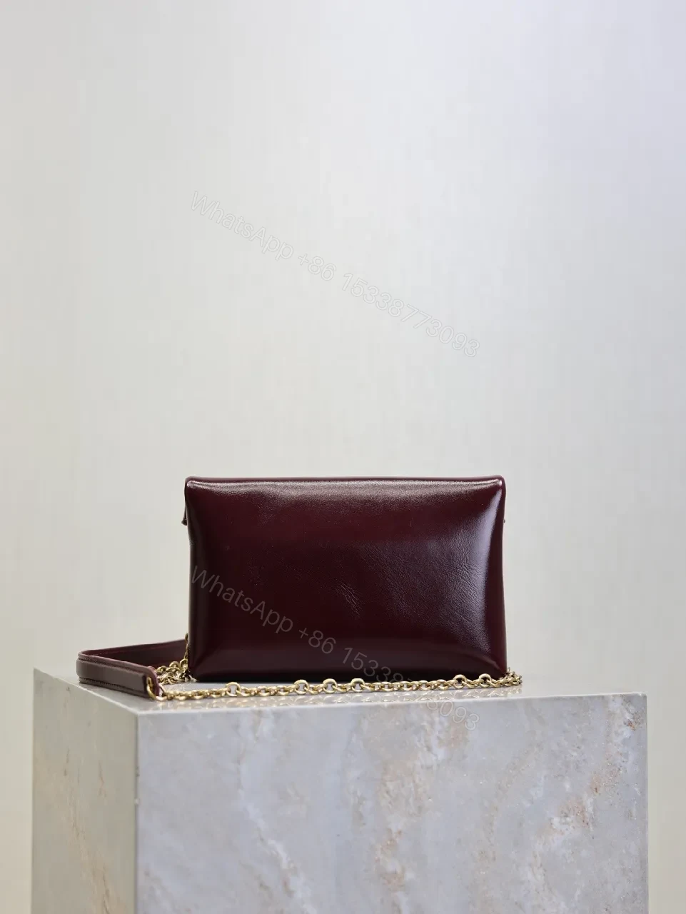 View 9 of Burgundy Leather Envelope Bag - Gold Hardware Elegance