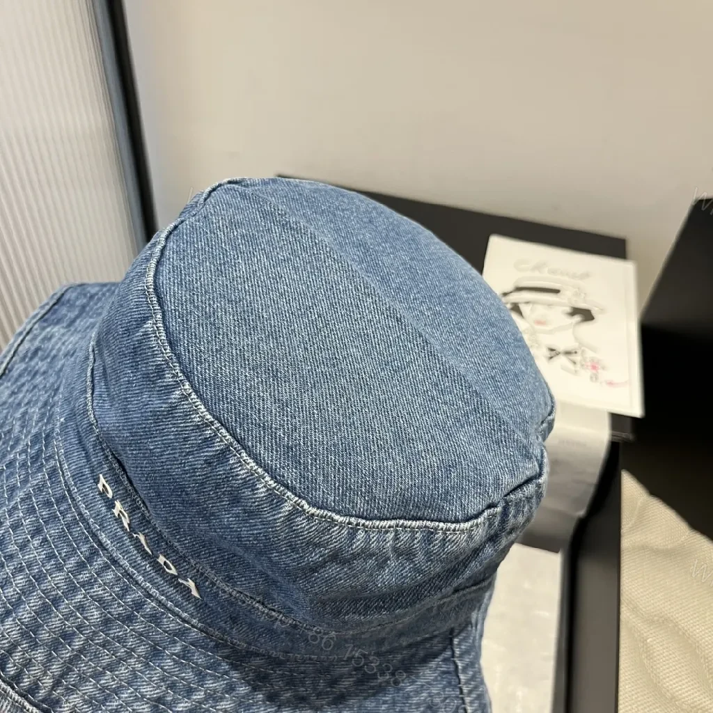 View 8 of Denim Bucket Hat with Lux Logo Detail - Essentials Style