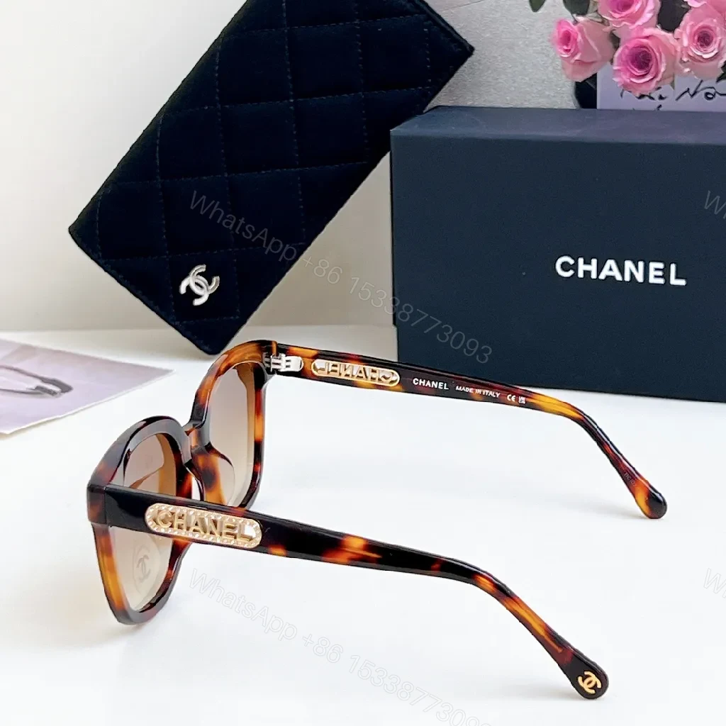 View 4 of Bold Black Sunglasses with Gold-Accent Luxury Detail (Sunglasses)