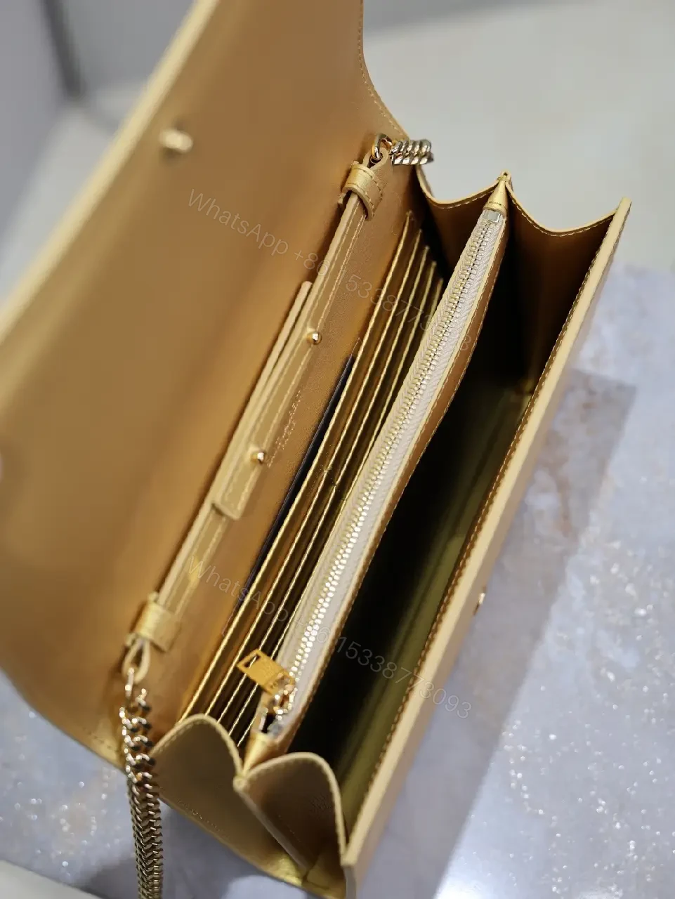 View 8 of Gold-Tone Leather Clutch Wallet with YSL Hardware