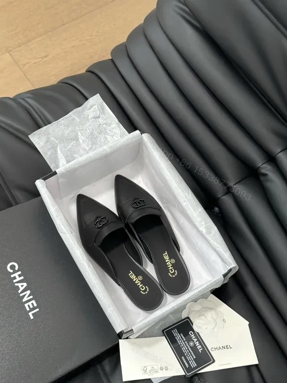 View 3 of Chic Black Leather Mules with CC Detail - Luxury Comfort