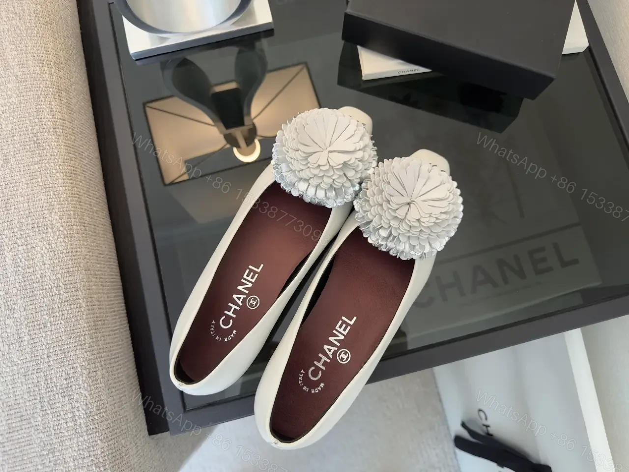 View 2 of White Leather Flats with Crochet Pom Floral—Chic Pointed-Toe Pumps