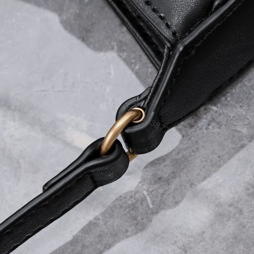 View 7 of Saint Laurent Le 5 A 7 Mini Vertical In Shiny Leather With Bronze Metal In Black 19cm
