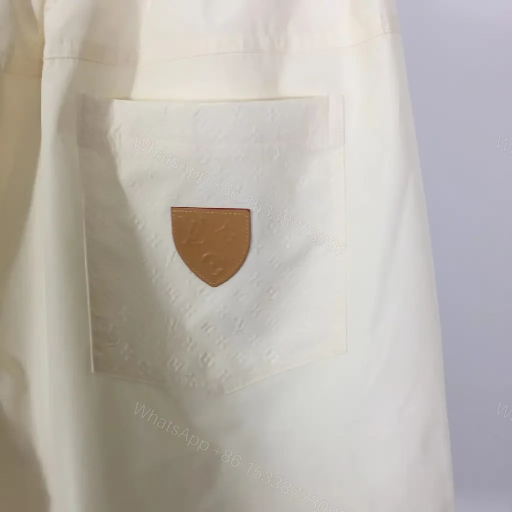 View 7 of Cream Canvas Shorts - Relaxed Style, Drawstring Waist, LV Logo