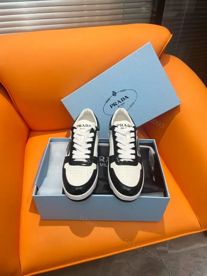 View 8 of DOWNTOWN LEATHER SNEAKERS IN WHITE AND LACQUER BLACK- PRD008