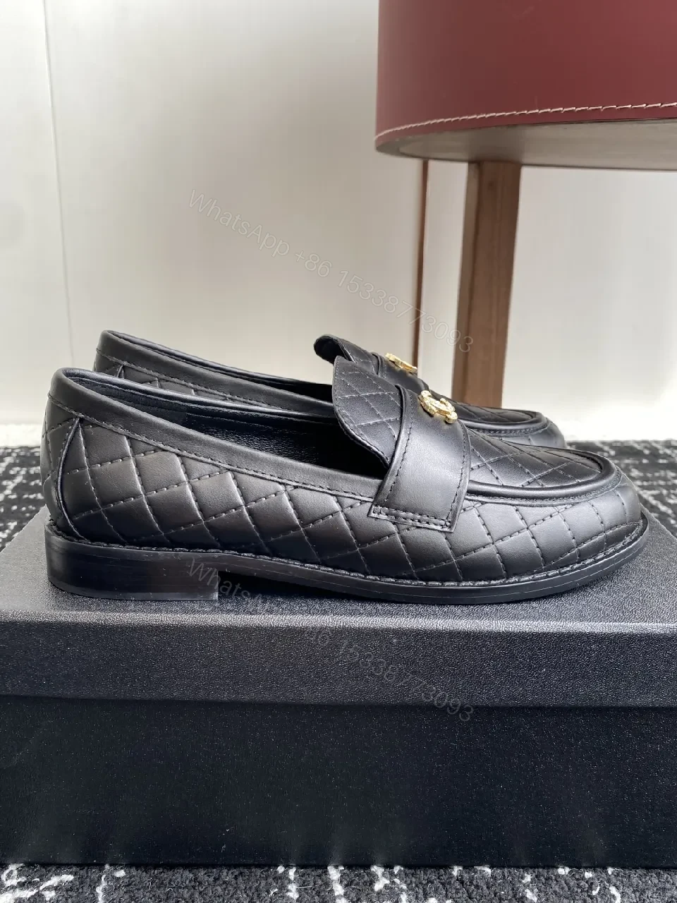 View 2 of Quilted Leather Loafers with Gold Crest – Modern Classic Comfort