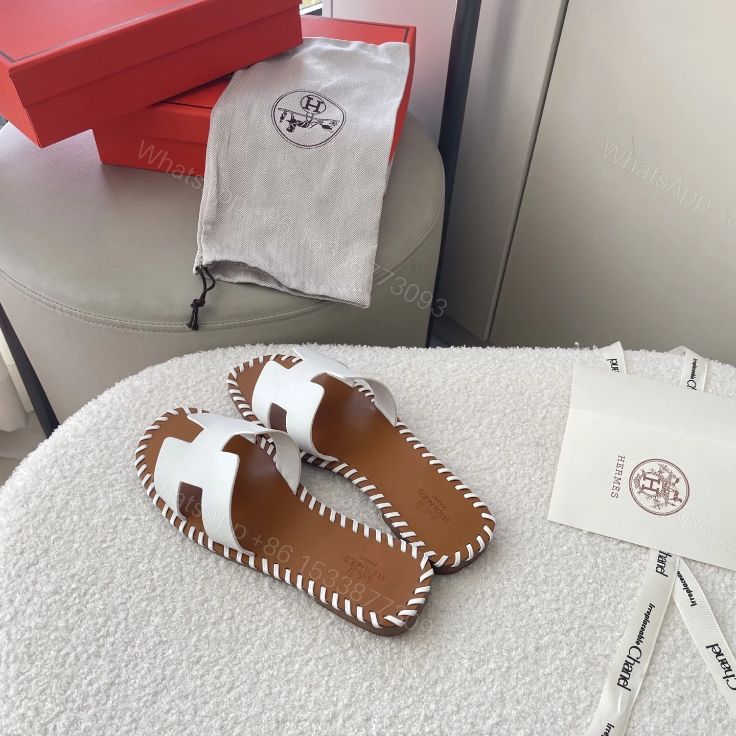 View 8 of HERMÈS ORAN SANDALS STITCHING IN BROWN AND WHITE