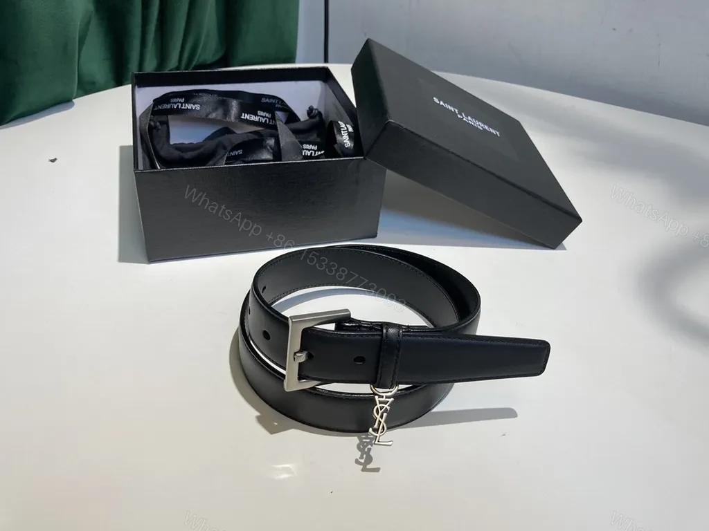 View 8 of Refined Black Leather Belt with Signature Charm - Luxury Everyday Accessory