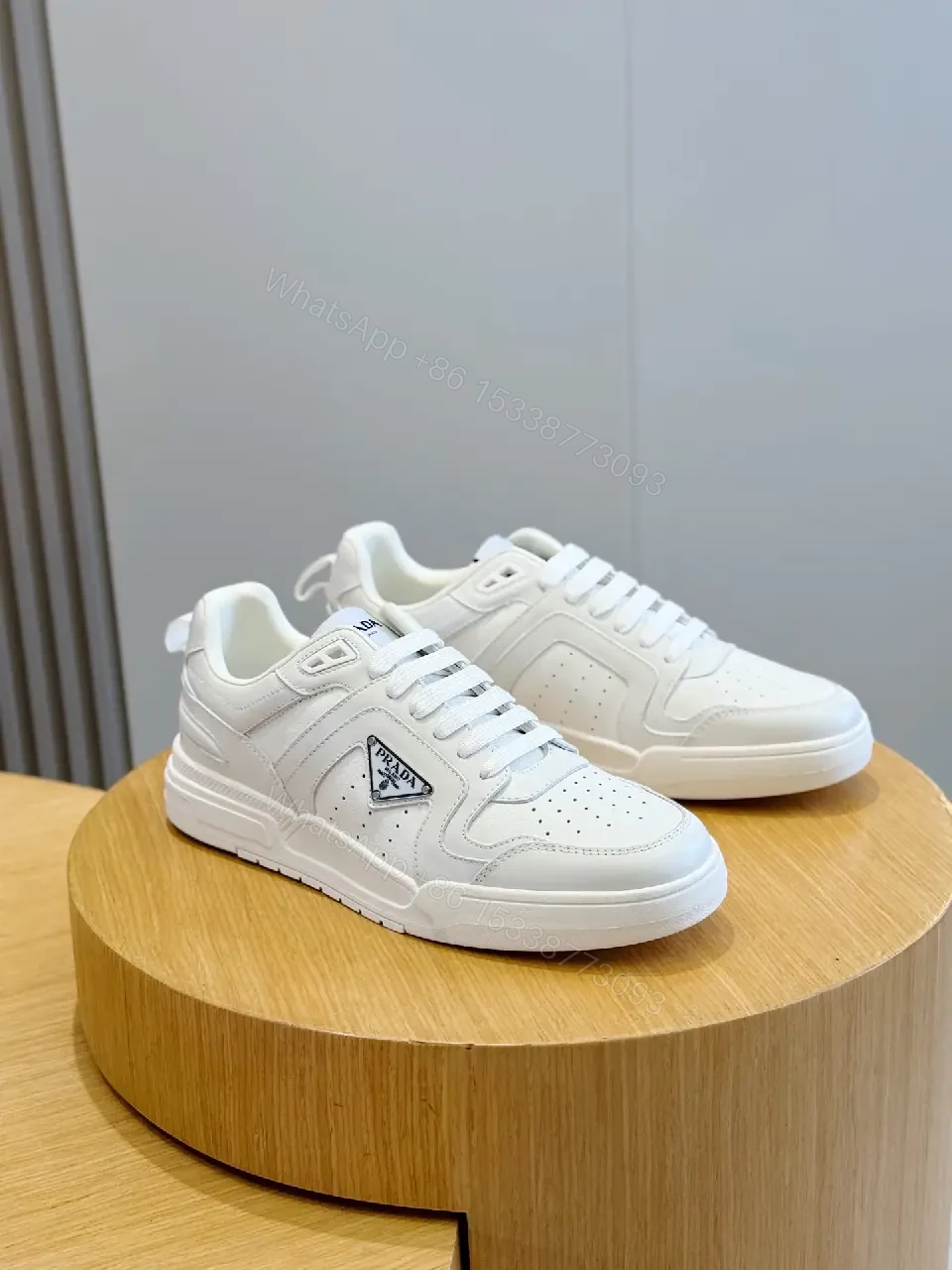View 3 of White Leather Sneakers Minimalist Cushioning Prada Style Sneakers
