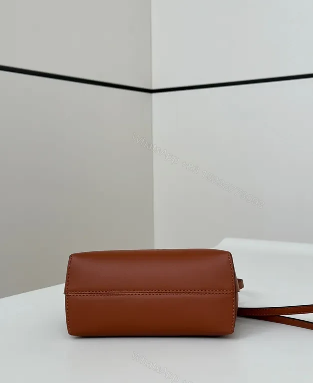 View 2 of Tan Leather Crossbody with Fendi Roma Monogram Crossbody Bag