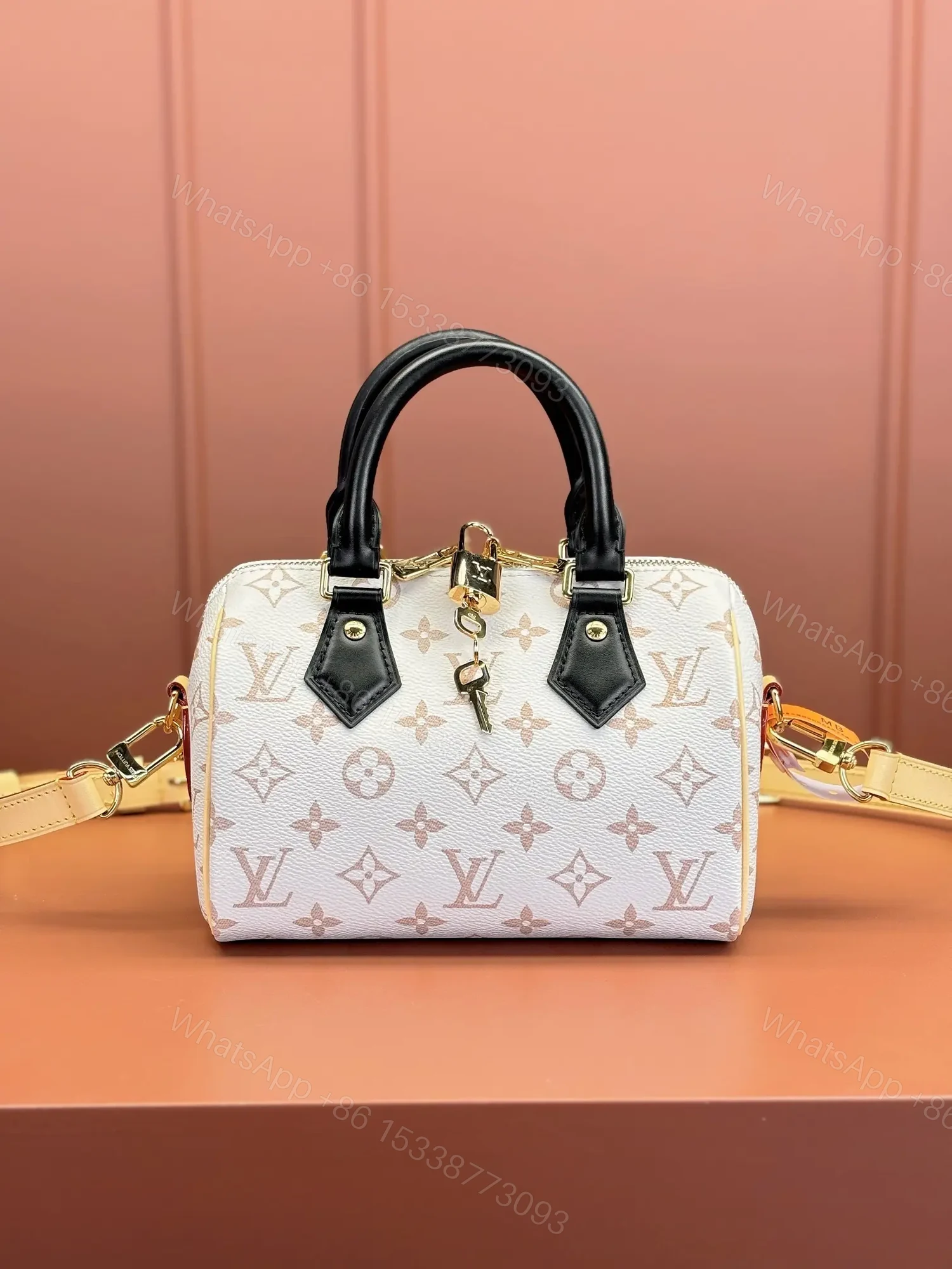 View 4 of Louis Vuitton Monogram Dune Speedy Bandoulière 20