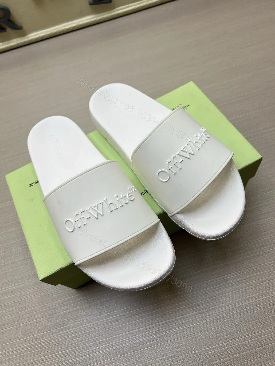 White Leather-Feel Slides + Embossed Logo + Minimalist Luxury Sandals — view 1