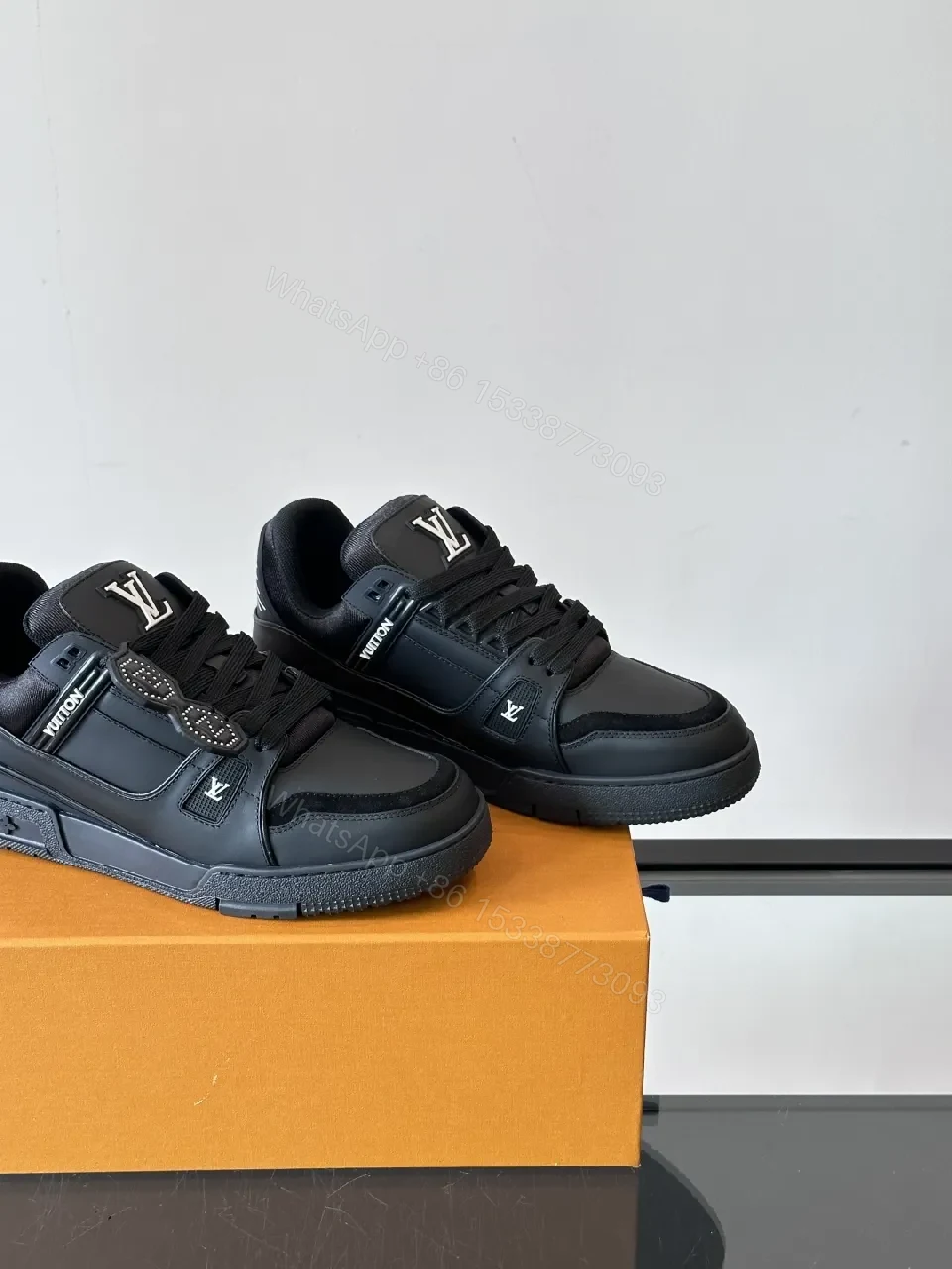 View 9 of Minimalist Black Leather Sneakers: Subtle Luxe Detailing High-Top
