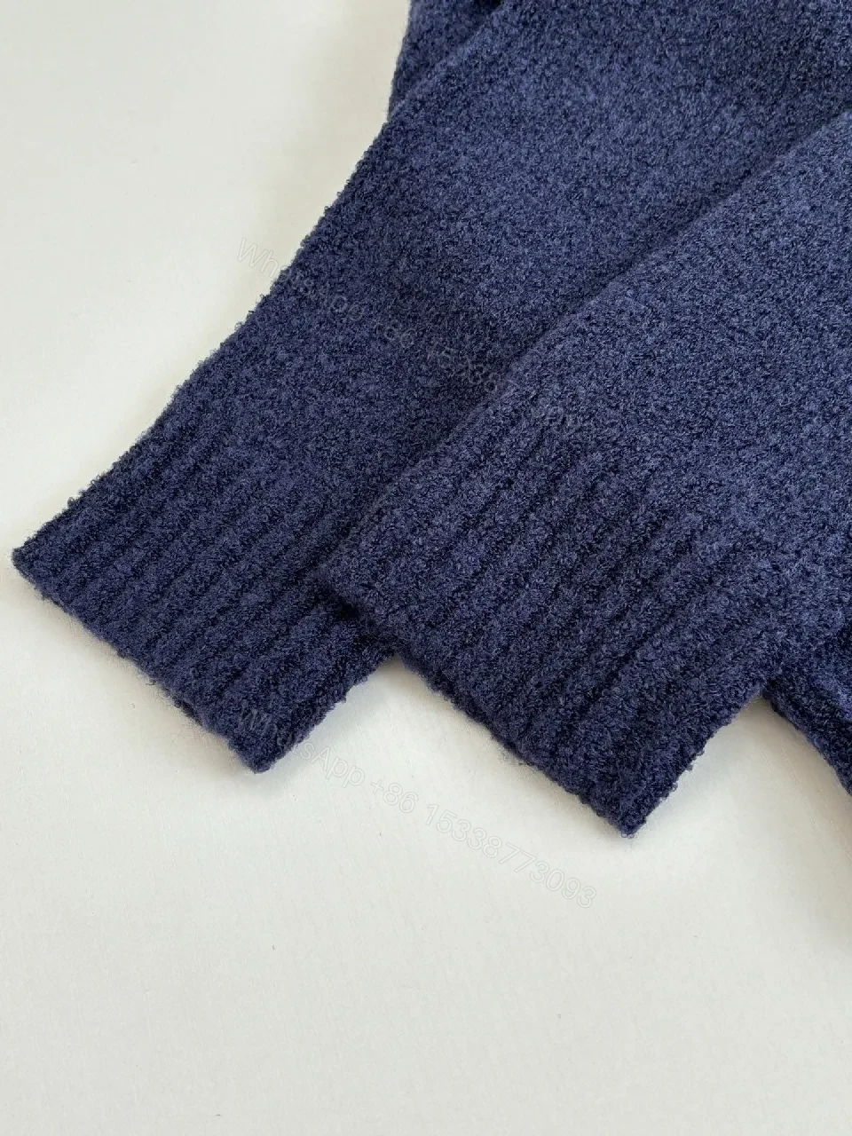 View 8 of Blue Knit Luxury Sweater with Signature Monogram Emblem