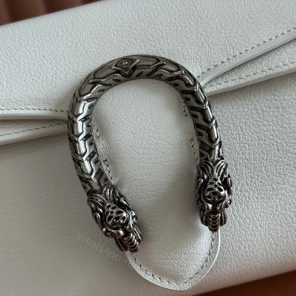 View 4 of Off-White Cream Pebbled Leather Structured Flap Bag with Gold Horseshoe Clasp