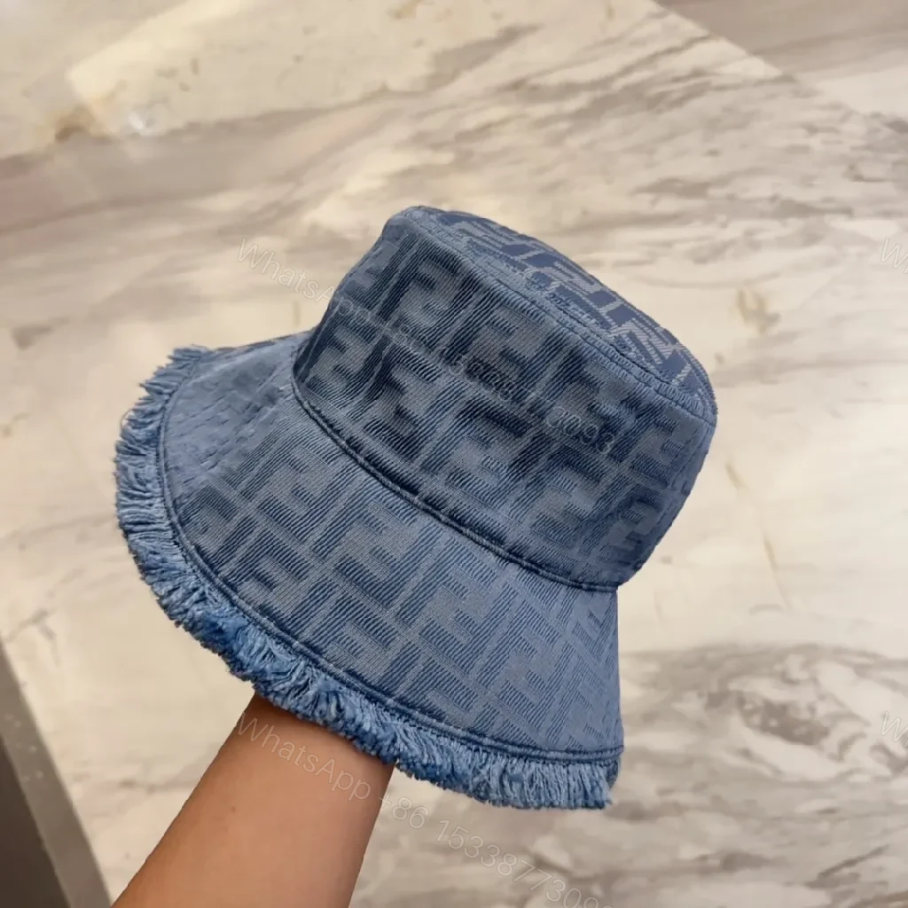 View 3 of Denim Monogram Fringe Bucket Hat – Luxe, Everyday Shade