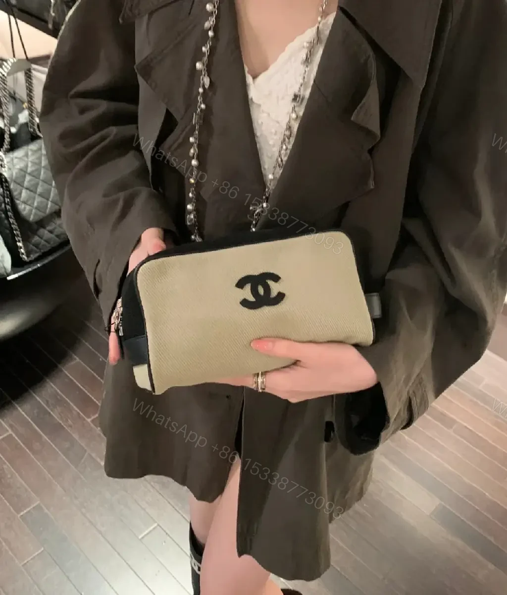 View 5 of Beige Canvas Pouch - Black Trim, Logo, Wrist Strap, Compact