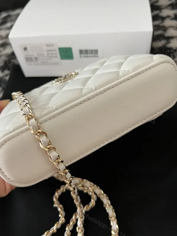 View 3 of Chic Quilted Mini Bag with Gold Emblem - White, Faux Leather, Luxe, Compact Luxury Bag