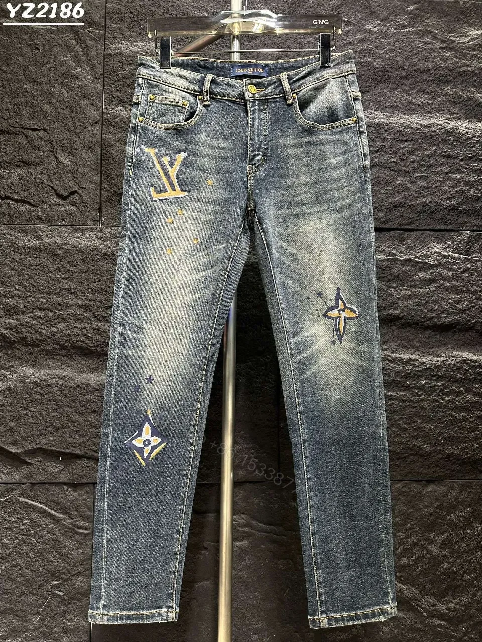 Distressed Indigo Jeans with LV-Inspired Embellishments - Denim Luxe style — view 1