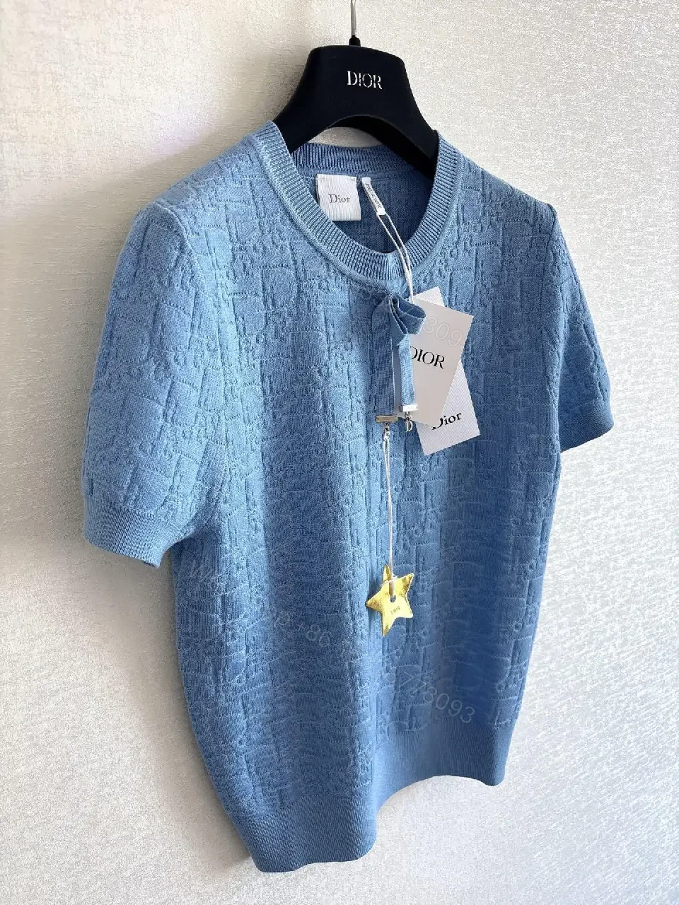 View 2 of Light-Blue Textured Knit Crewneck - Subtle Designer Pattern