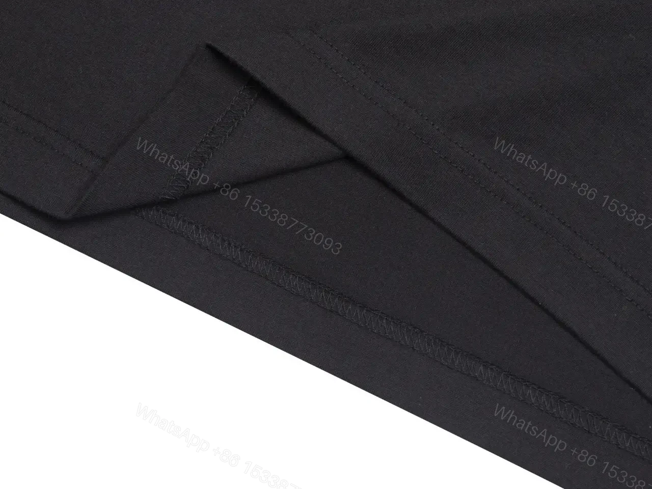 View 2 of Chic Black Cotton Tee with Subtle Metallic Logo, Luxury Everydaywear
