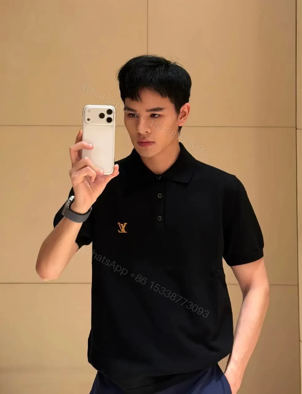 View 9 of Solid Black Polo Shirt with Gold LV Logo, Short Sleeves, Classic Collar