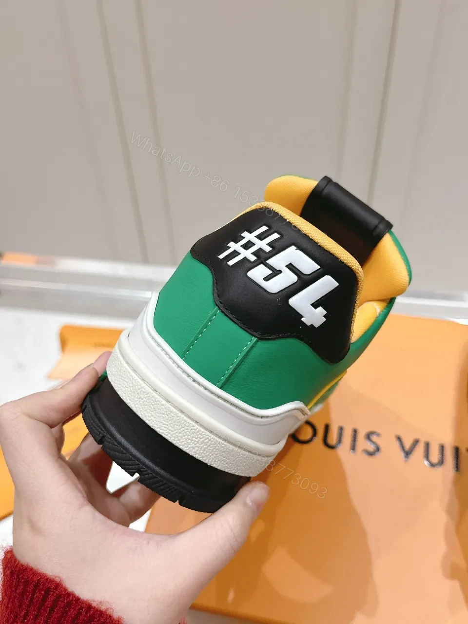 View 2 of Green Lux Leather High-Top Sneaker with LV Accents