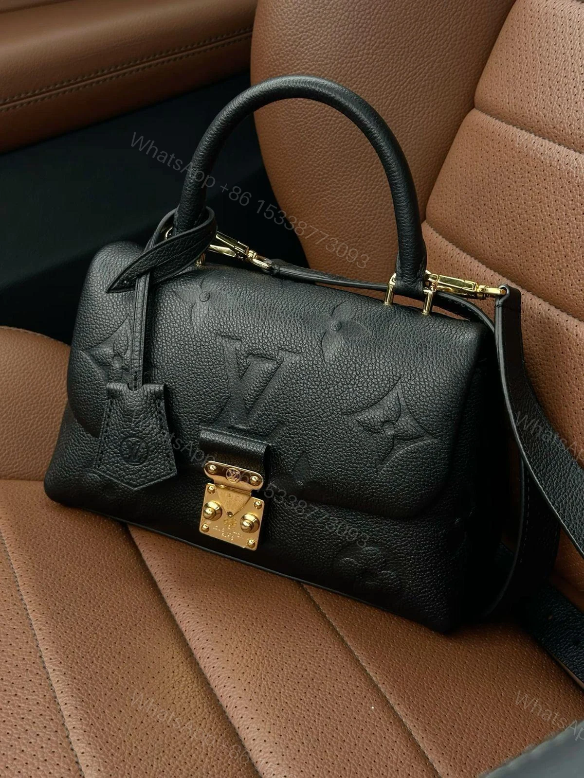 Louis Vuitton Madeleine BB Top Handle Black Leather First Copy | AAA+ Replica — view 1