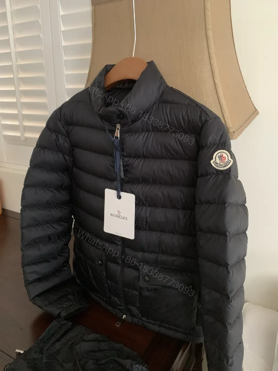 View 6 of Black Nylon Puffer Jacket: Sleek, Insulated Warmth with Patch