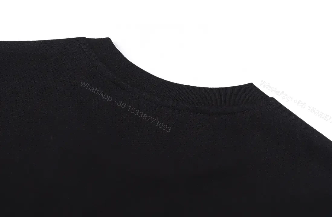View 4 of Minimalist Black Tee, Premium Cotton, Modern Fit, Logo Detail, T-Shirt